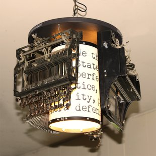 Dissected Royal Portable Standard Model O Reconstructed into Quirky Ceiling Light.